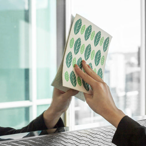 Swedish Sponge Cloth with Planta design used to polish a reflective surface